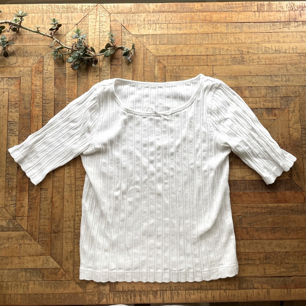 Coquette quarter-sleeved top